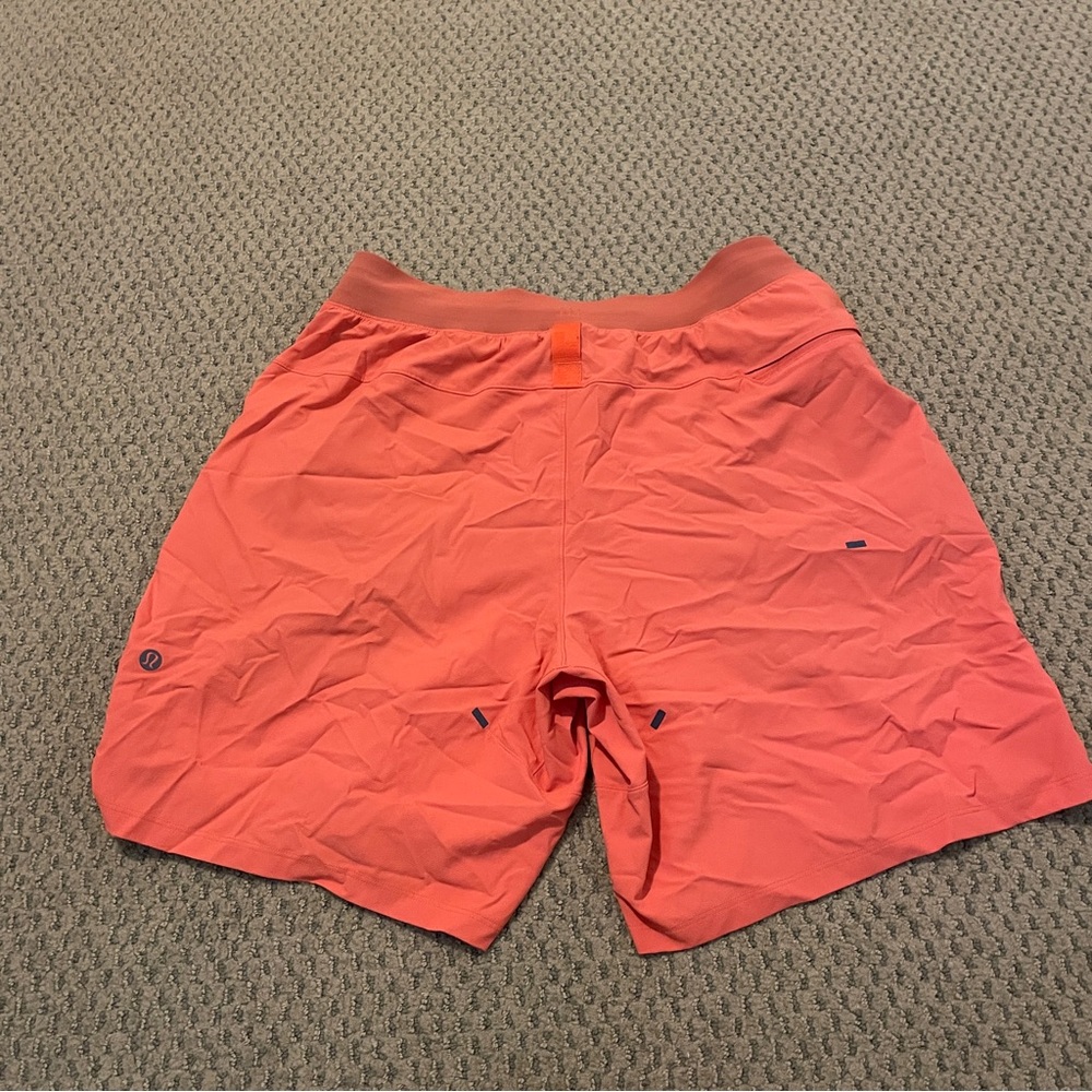 lululemon men's license to train linerless short 7" orange